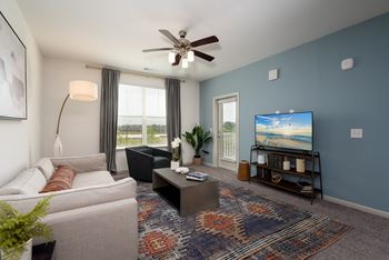 Living Room With Ceiling Fan & Light